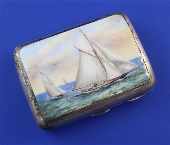 A late Victorian silver and enamel cigarette case painted with yachts at sea, 3.25in.